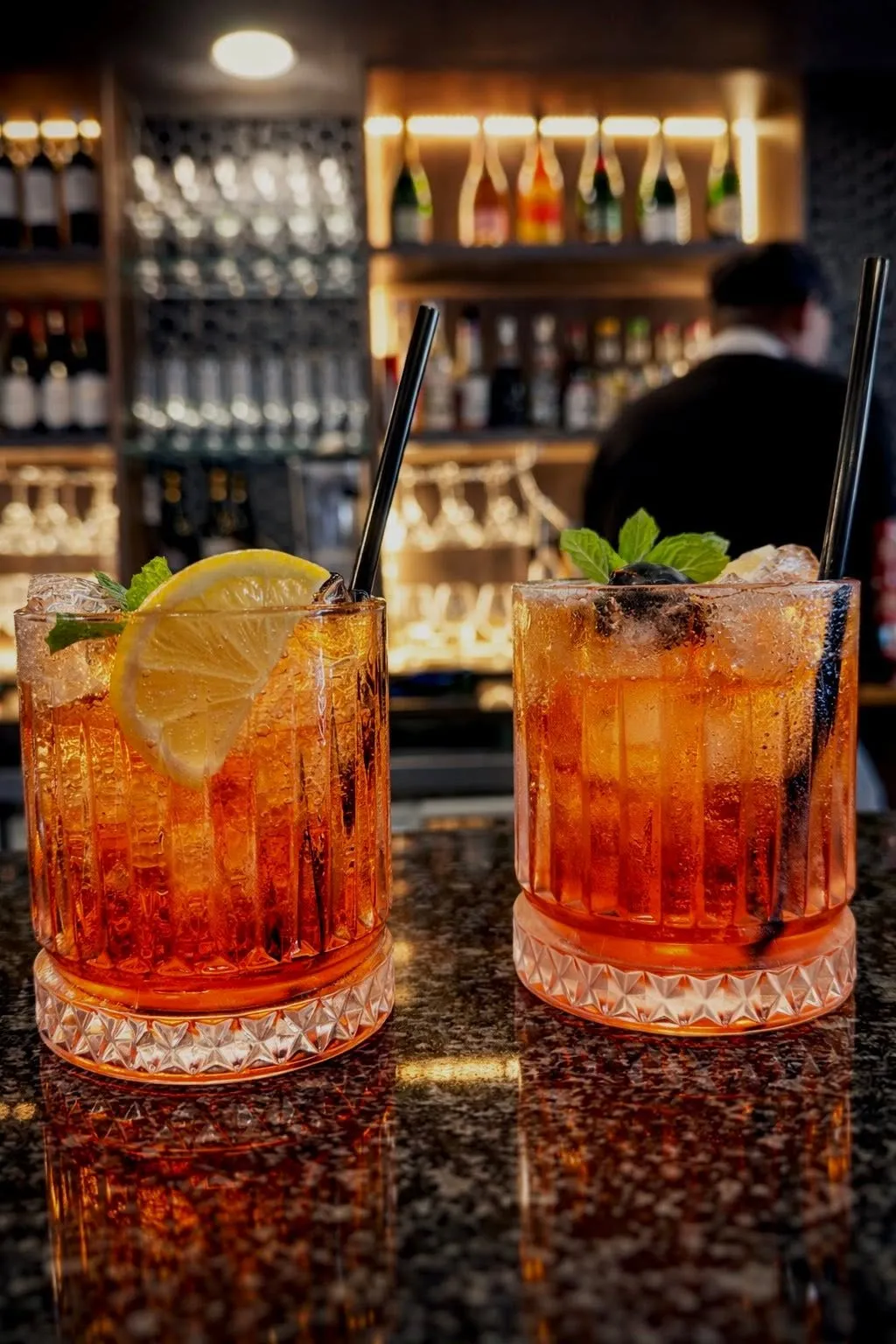 Two cocktails on the bar counter
